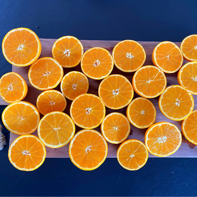 Organic oranges in halves