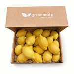 Box of organic lemons with 'greenmate' branding on a white background