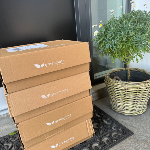 Home delivery, four boxes from Greenmate at the doorstep