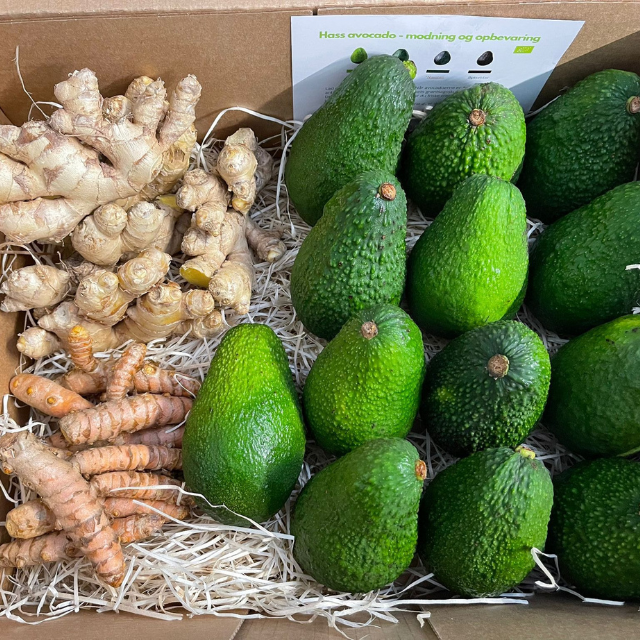 box with some avocados, ginger and turmeric